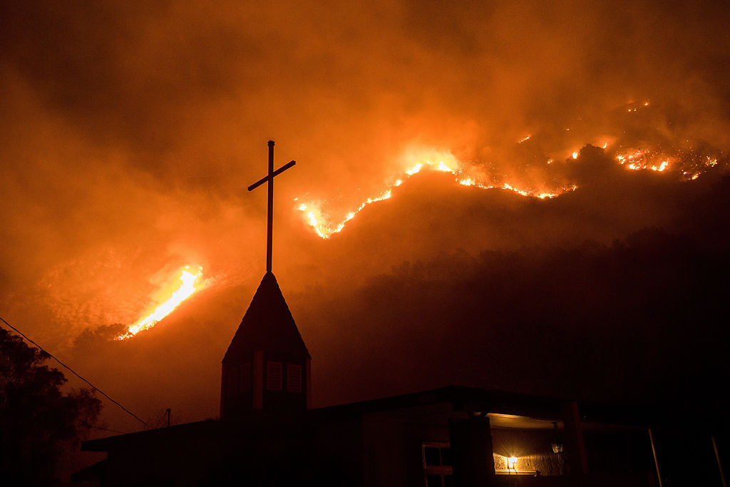 California wildfires rip through communities